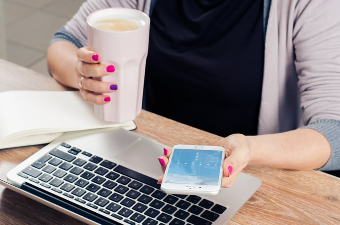 recruiter at laptop looking to improve recruitment process in 2017